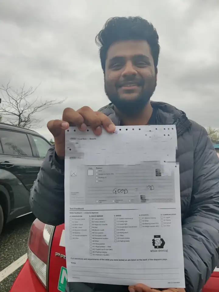 A Top Gear Driving School student after passing the road test